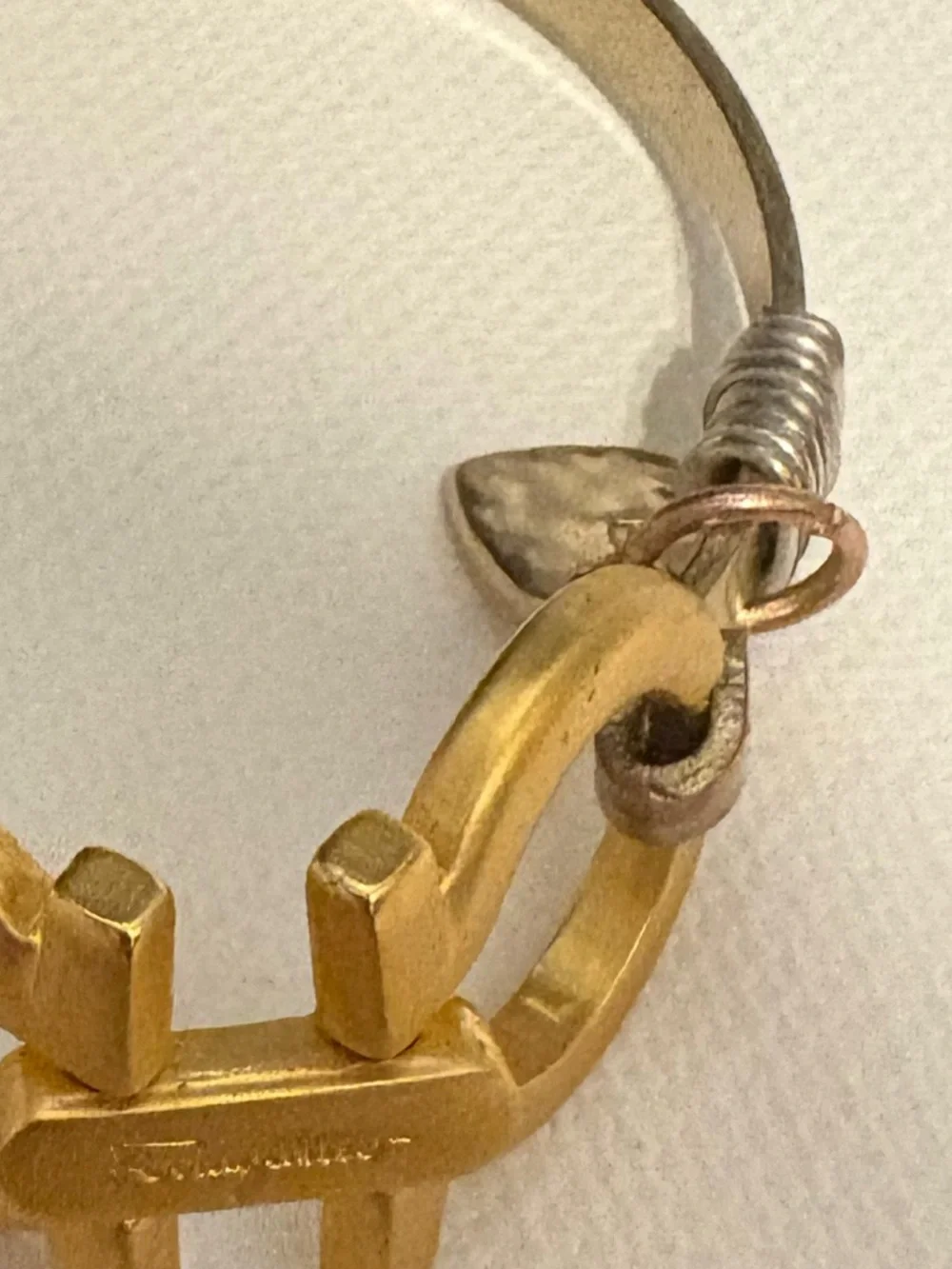 Authentic Salvatore Ferragamo charm set on unbranded bangle bracelet